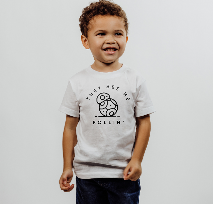 They See Me Rollin' Bella Canvas Toddler Short Sleeve Tee