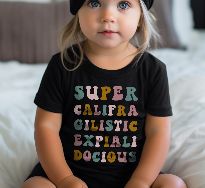 Super Califra Gilistic Expiali Docious Bella Canvas Baby Short Sleeve T-Shirt