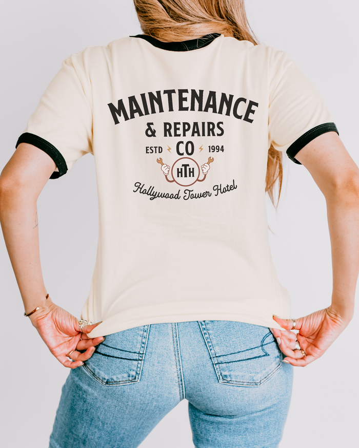 Hollywood Tower Hotel Maintenance & Repairs Next Level Unisex Cotton Ringer T-Shirt